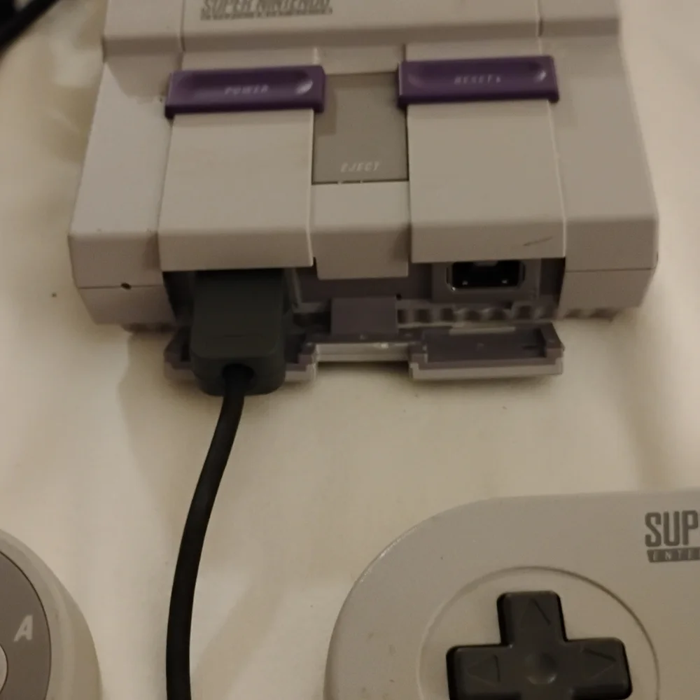 Nintendo Console with Gray and Purple Design